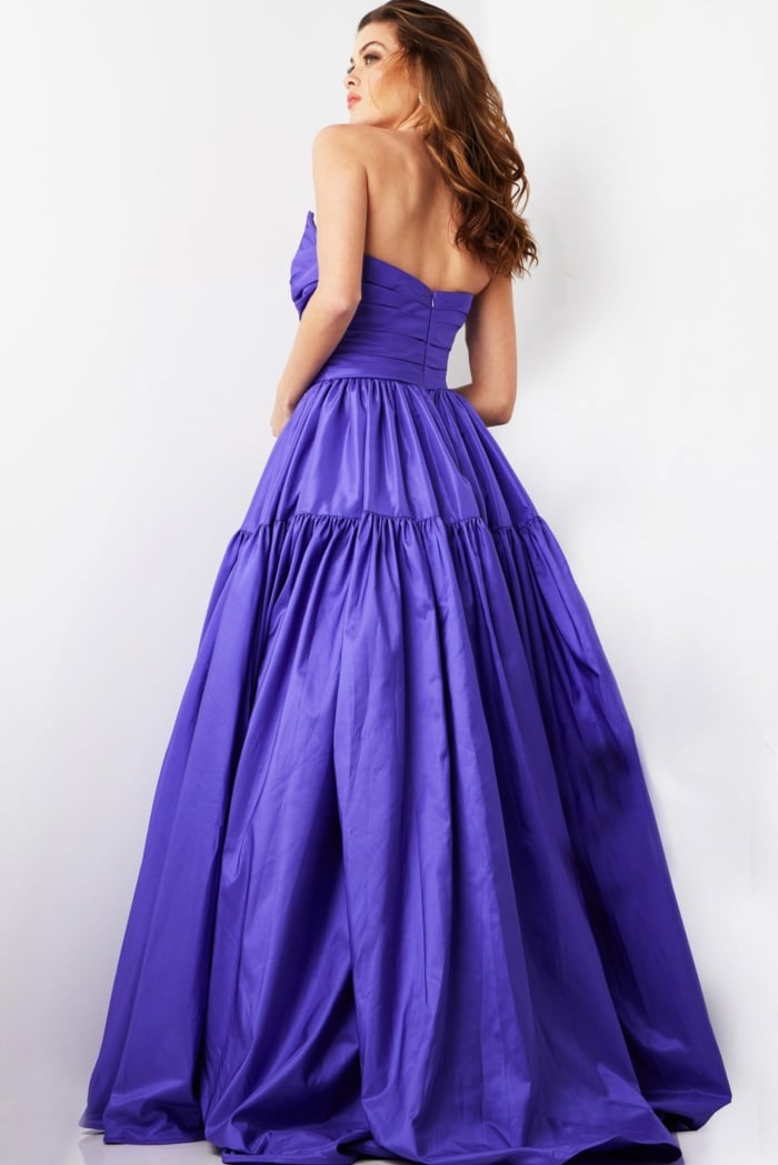 model wearing 38331, back view of a purple strapless gown