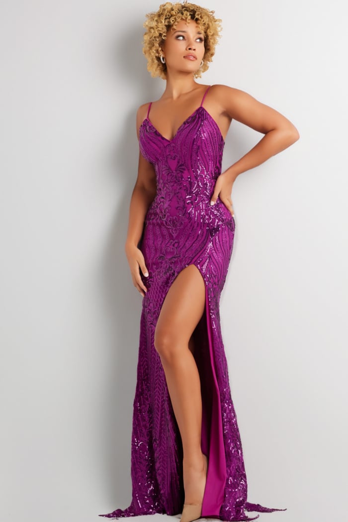 Model wearing Jovani 38337 purple gown with V-neckline and intricate design.
