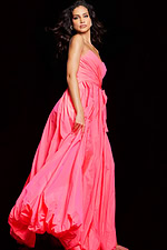 Model wearing Jovani 38382 pastel pink dress in graceful pose