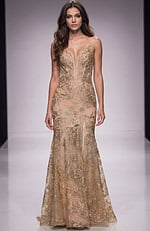 Fitted gown with sheer illusion bodice, intricate beaded embroidery, and a soft floor length silhouette that creates an elegant, refined look