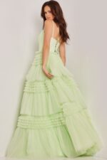 Jovani 38477 green gown back view with lace-up detail.