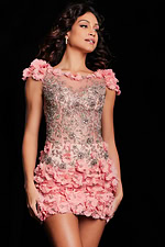 Model wearing Jovani 38510 detailed blush dress with beadwork