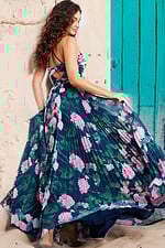 Back view of model wearing Jovani 38638 navy floral dress with cross-back straps.