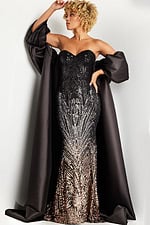 model wearing 38746 black gown front view with detachable sleeves