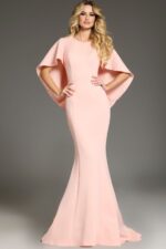 Jovani 38822 blush dress with cape sleeves and fitted mermaid silhouette.