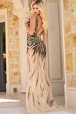 Back view of model wearing Jovani 38857 with low-cut design.
