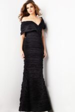 Model wearing Jovani 38954 black gown, front view with mermaid silhouette.