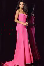 Model showcasing Jovani 38974 pink mermaid gown with sweetheart neckline from the side