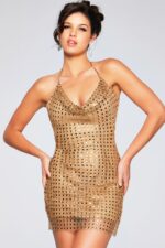 Model wearing Jovani 39004 gold dress showcasing detailed front