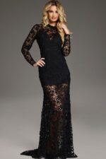 Model posed in Jovani 39034 black gown with long sleeves and floral lace.