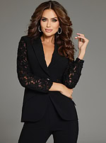 Close-up of model in Jovani 39074, showcasing lace sleeve details.