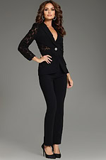 Side view of model wearing Jovani 39074 black ensemble.