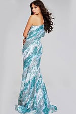 model wearing Jovani 39077 green sequin one-shoulder gown back angle view