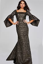 Model wearing Jovani 39080 elegant brown gown with square neckline and bell sleeves