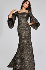 Model showcasing the Jovani 39080 brown gown with elegant flared sleeves