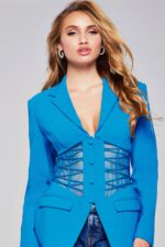 Model wearing Jovani 39108 blazer, highlighting the front and mesh design.