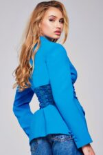 Model wearing Jovani 39108 blazer showcasing the back and mesh detailing.