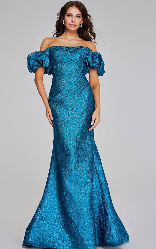 Model wearing Jovani 39113, an off-the-shoulder teal dress with puffed sleeves and a fitted design.