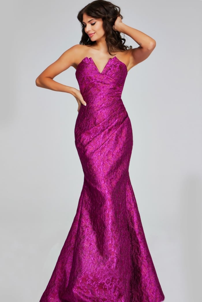 Model showcasing Jovani 39114 fuchsia gown, close-up front view.