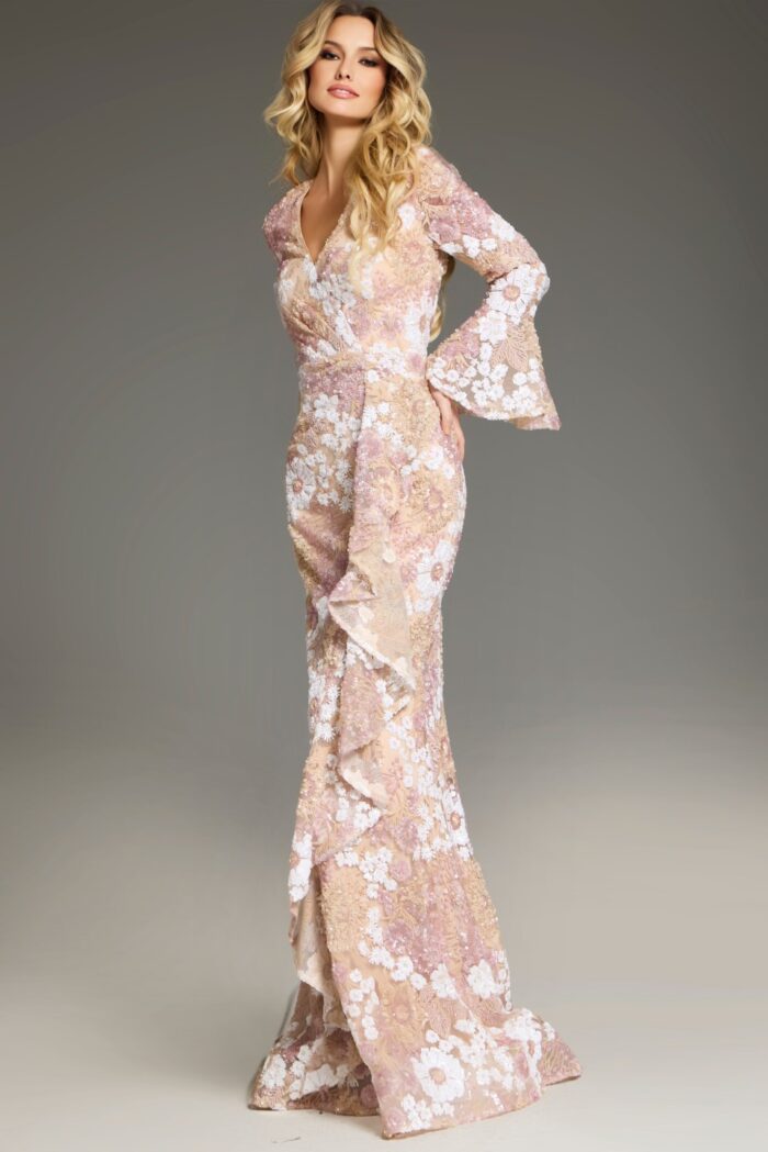 Model wearing Jovani 39118 nude gown side view with floral details.