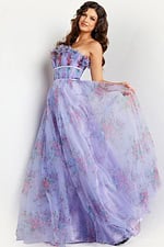 Model wearing Jovani 39151 lilac floral dress showing the back with lace-up detail