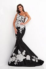 Model wearing Jovani 3918 black dress with silver floral lace, close-up front view.