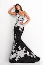 Model wearing Jovani 3918 black dress with silver floral lace, alternate front view.