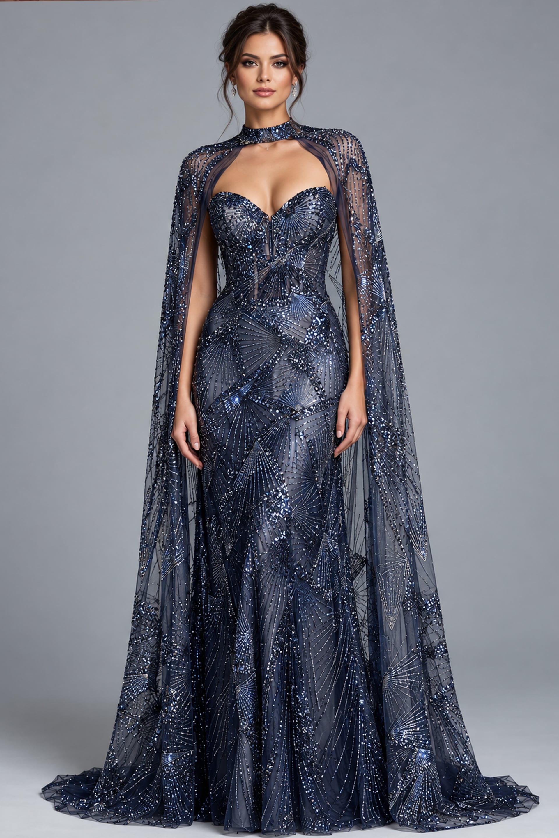 Navy beaded strapless gown with sheer embellished cape and fitted mermaid skirt