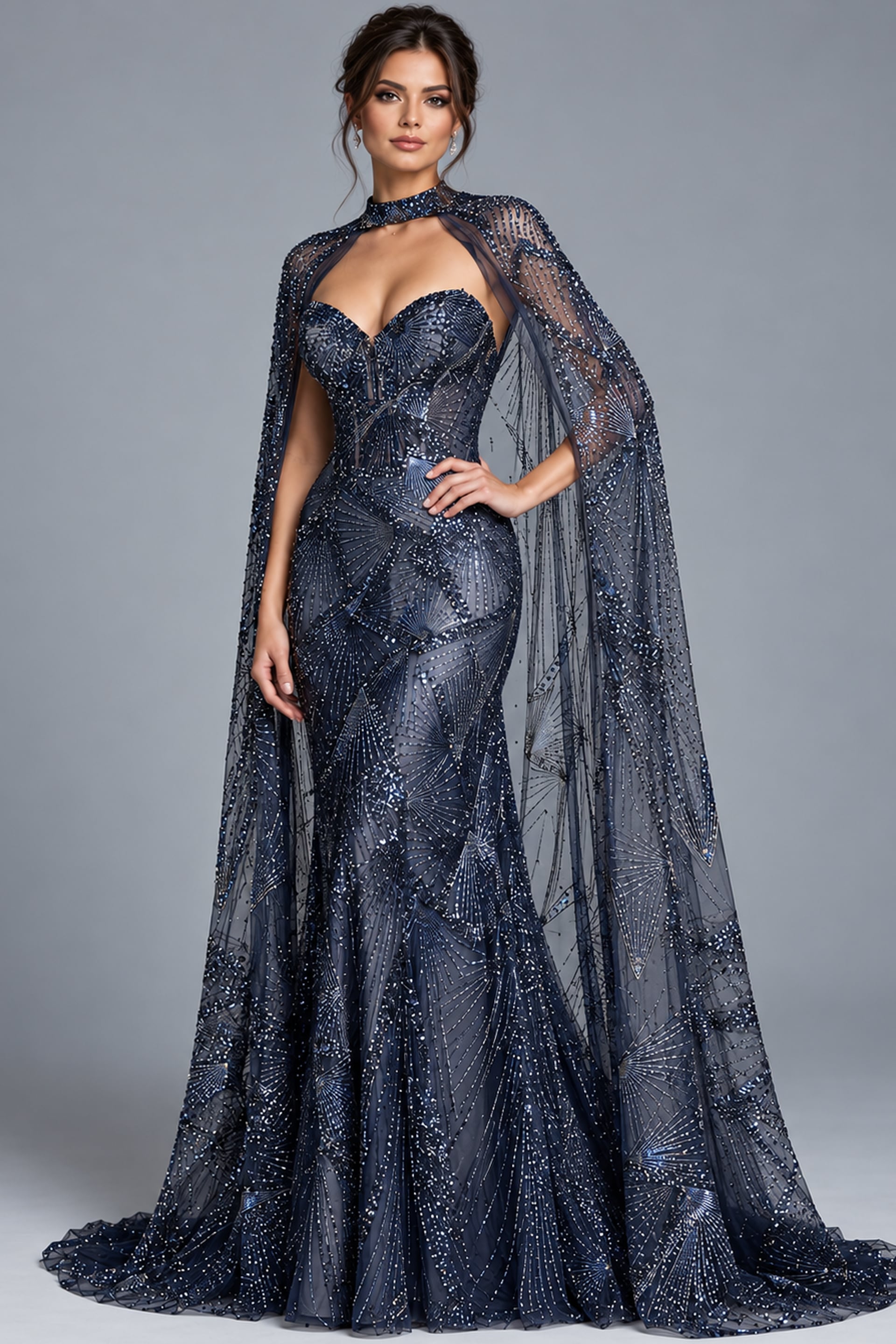 Close front view of navy beaded gown showing the strapless bodice and sequin pattern