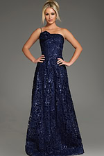 Model wearing Jovani 39224 navy dress, full-length front view with intricate lace design.