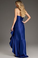 Back view of model in Jovani 39265 blue gown with cascading ruffles