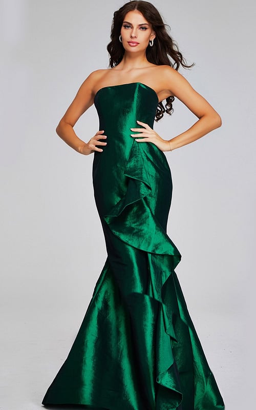Model wearing Jovani 39368 green gown with ruffle detail, front view.