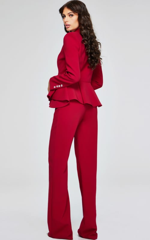 model wearing 39374 red two-piece suit, back view showcasing peplum detail