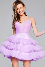 Model showcasing Jovani 39656 lilac dress with V-neckline and ruffles.