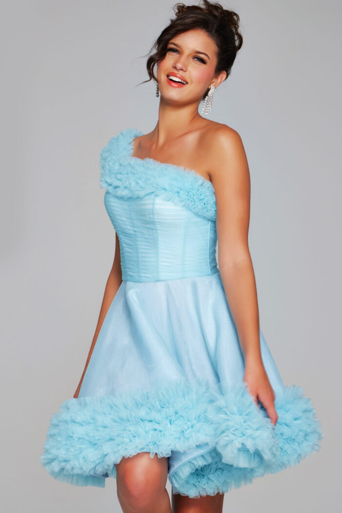 Model wearing Jovani 39665 in blue, one-shoulder cocktail dress with ruffle detailing.