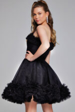 Back view of Jovani 39665 in black, highlighting the one-shoulder detail and tulle skirt.