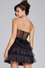 Model wearing Jovani 39666 black dress, back view.