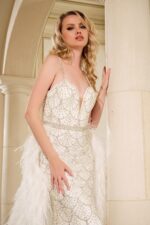 Close-up of the Jovani 39677 white gown highlighting the intricate embellishments.