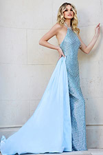 Model wearing Jovani 39715 blue dress with halter neckline, side view