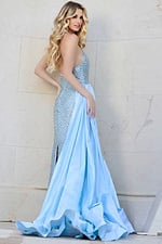 Model wearing Jovani 39715 blue dress with halter neckline, back view