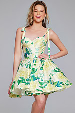 Model in Jovani 39881 green floral dress with sweetheart neckline and A-line shape.