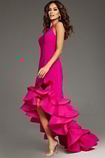 Model in Jovani 39893 fuchsia dress with ruffled high-low hemline, side view.