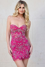 Model in Jovani 39911 hot pink dress with floral embellishments, front view