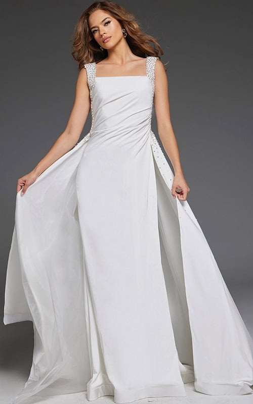 Model wearing Jovani 39921 elegant floor-length white gown with square neckline and embellished straps