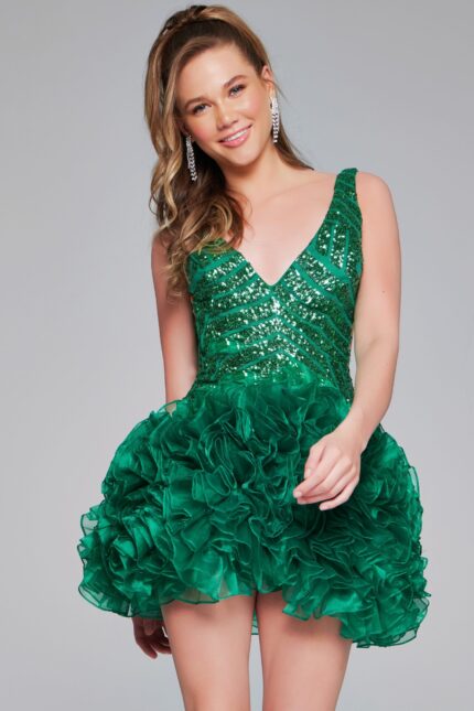 Model wearing Jovani 39931 dress in green with deep V-neckline and ruffled skirt.