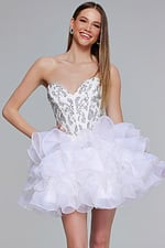 Model showcasing Jovani 39932 off-white short dress with sweetheart neckline and full ruffled skirt.