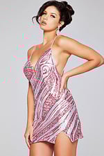 Model wearing Jovani 39934 pink mini dress with sequins, front view close-up.