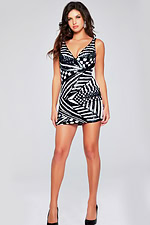 Model wearing Jovani 39952 black mini dress with geometric sequins, front view.