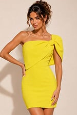 yellow bodycon mini dress with one-shoulder neckline, shoulder bow, and asymmetrical bodice