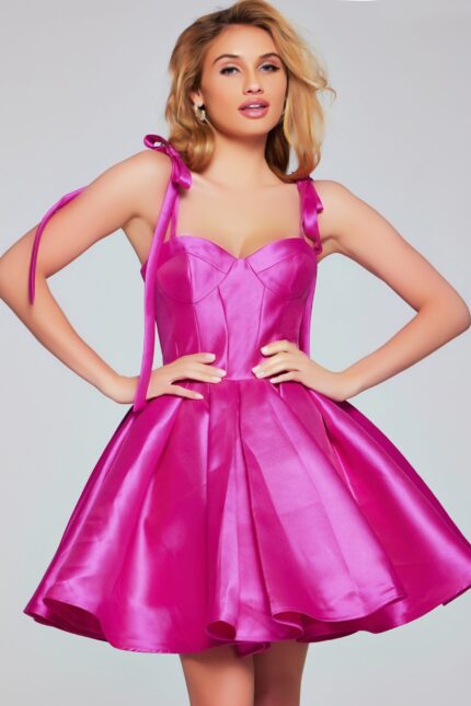 Back view of model wearing Jovani 39979 pink dress with flowing A-line silhouette.